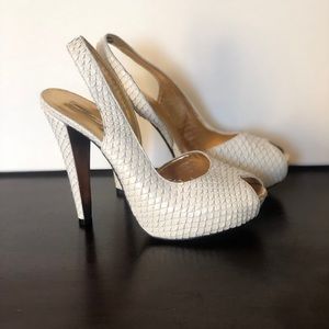 Sling back white Stiletto heels